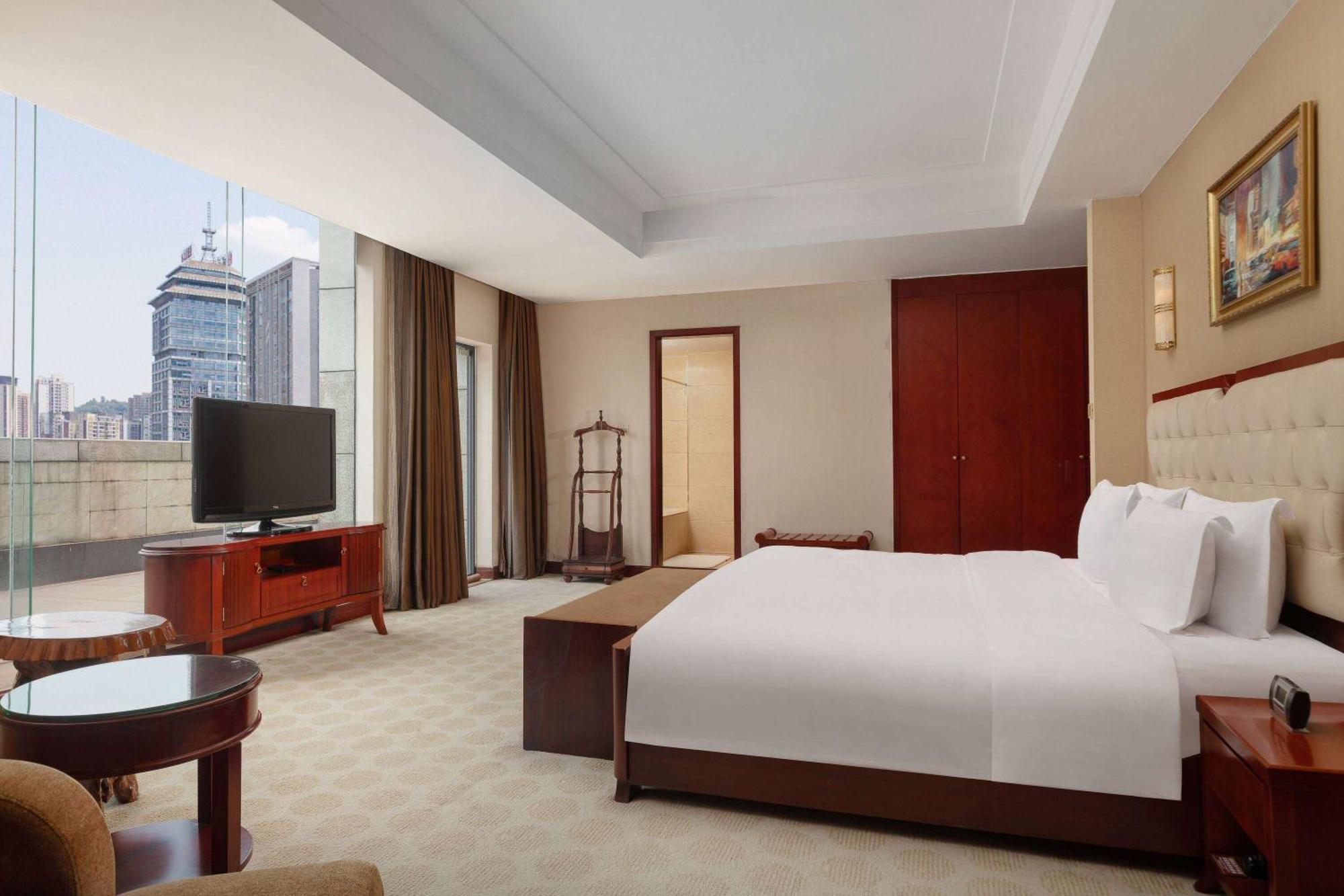 Hotel Ramada Plaza By Wyndham Chongqing West Esterno foto
