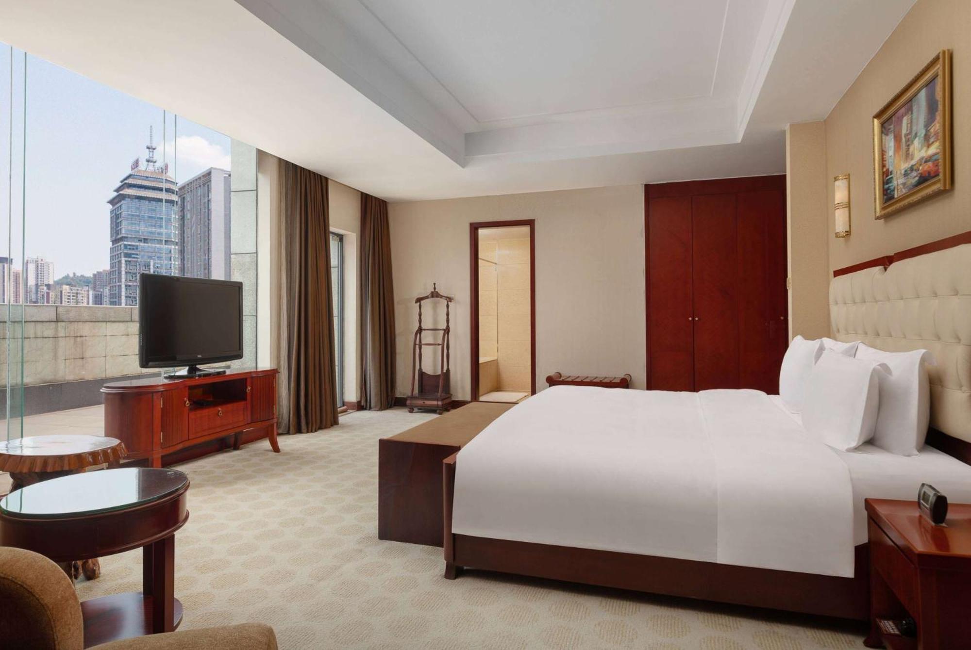 Hotel Ramada Plaza By Wyndham Chongqing West Esterno foto