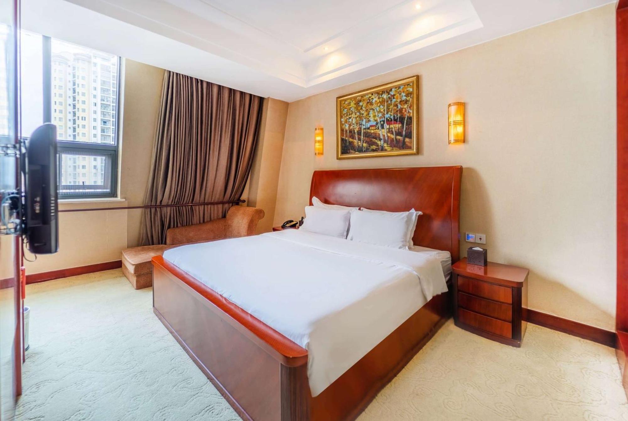 Hotel Ramada Plaza By Wyndham Chongqing West Esterno foto