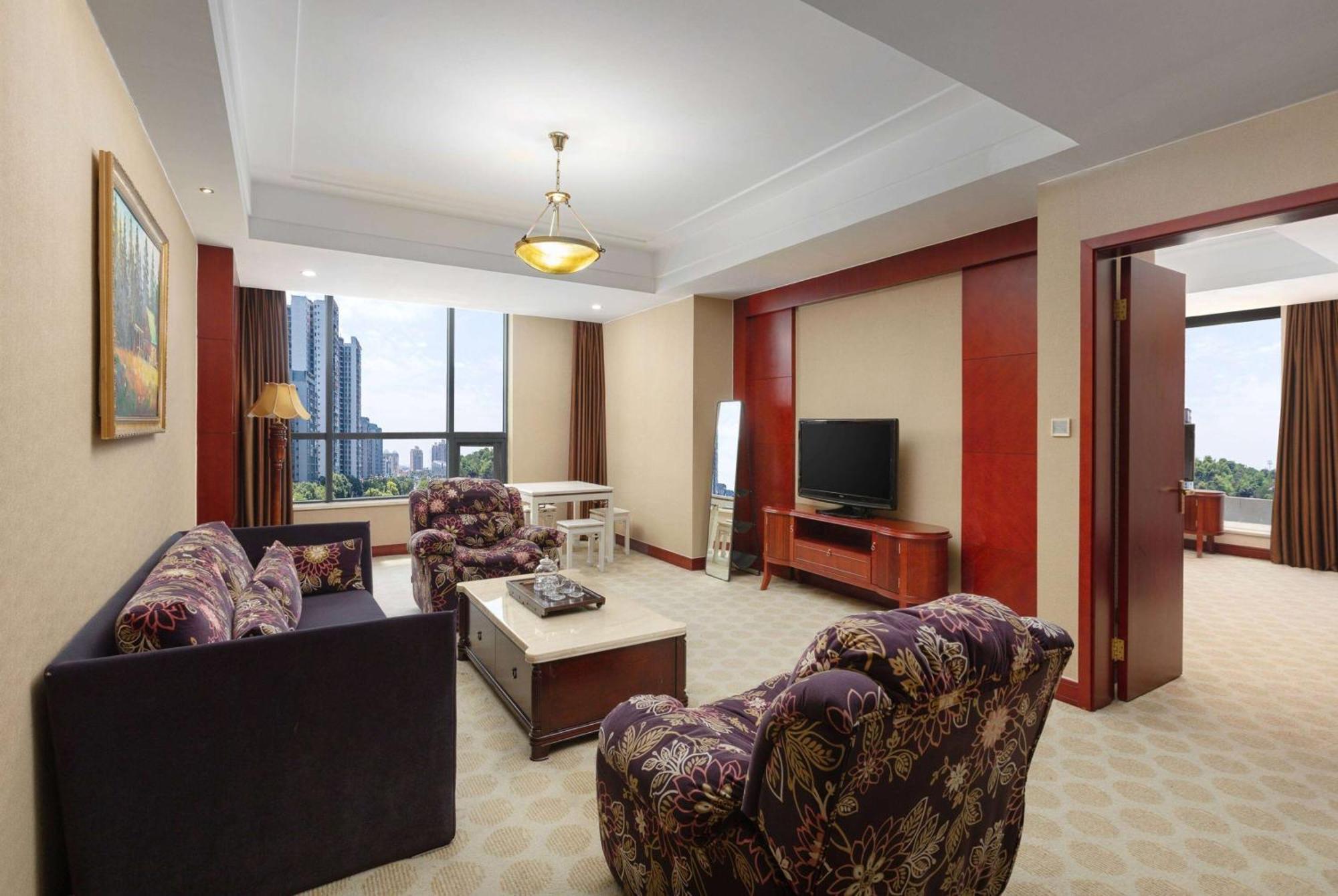 Hotel Ramada Plaza By Wyndham Chongqing West Esterno foto