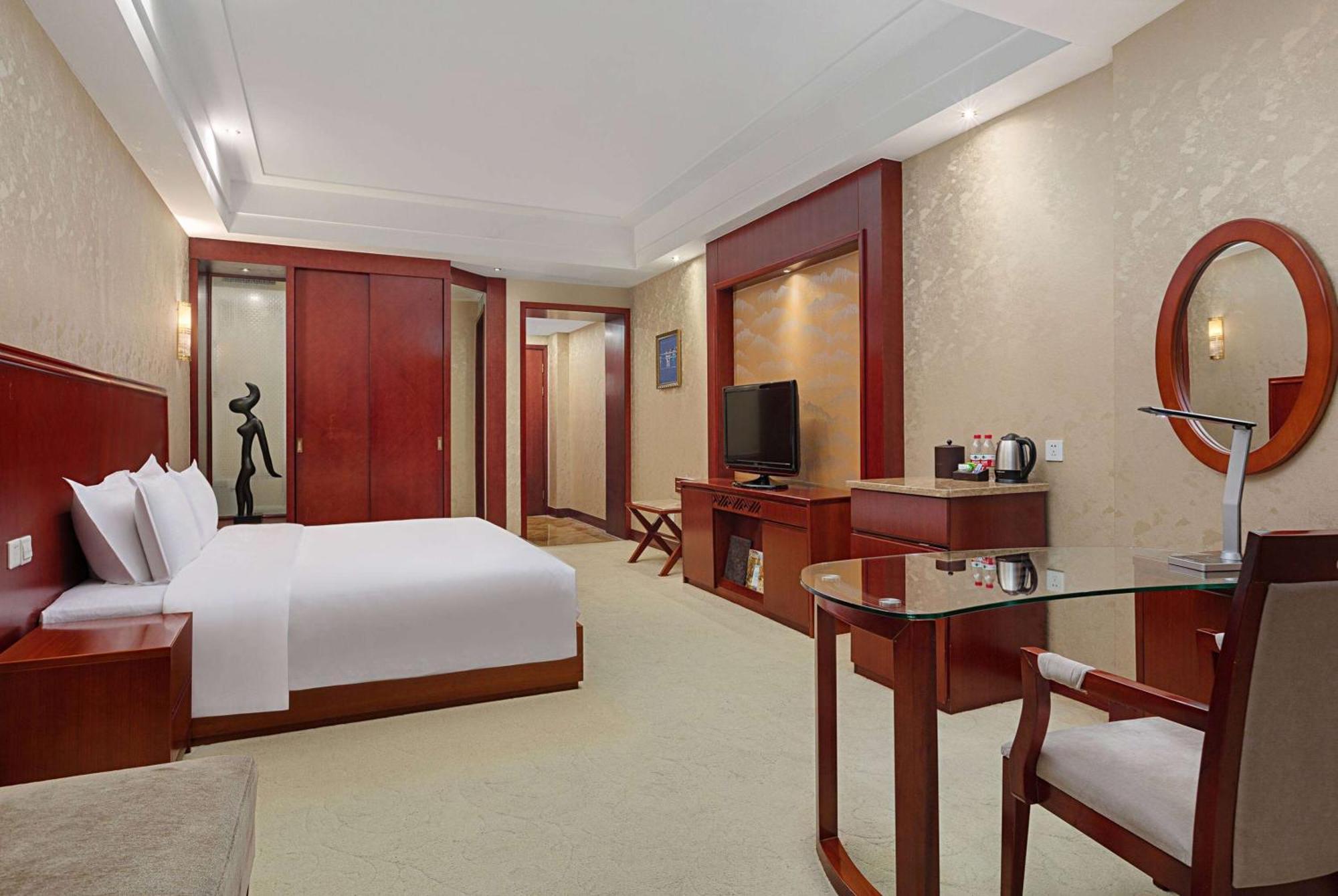 Hotel Ramada Plaza By Wyndham Chongqing West Esterno foto