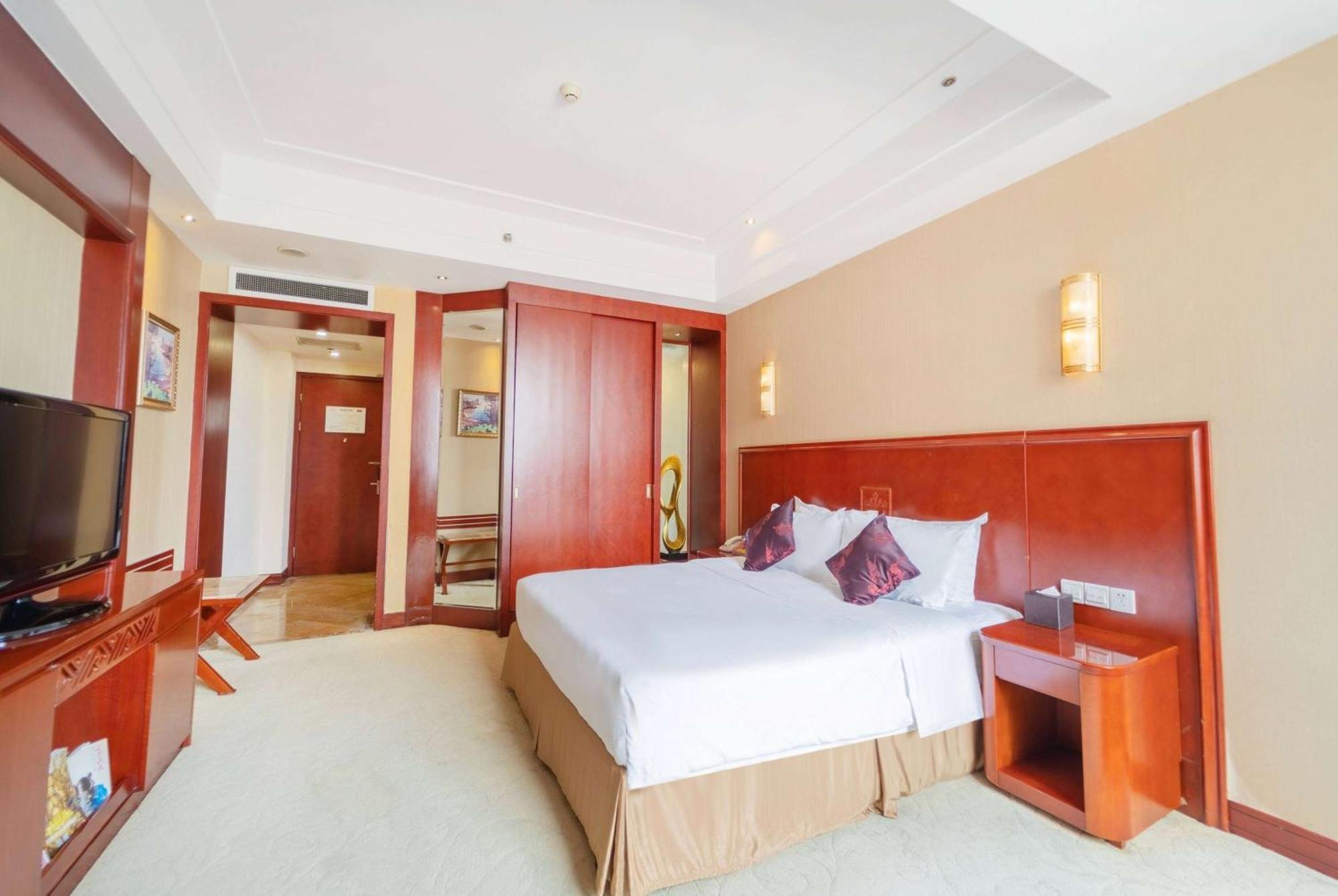 Hotel Ramada Plaza By Wyndham Chongqing West Esterno foto