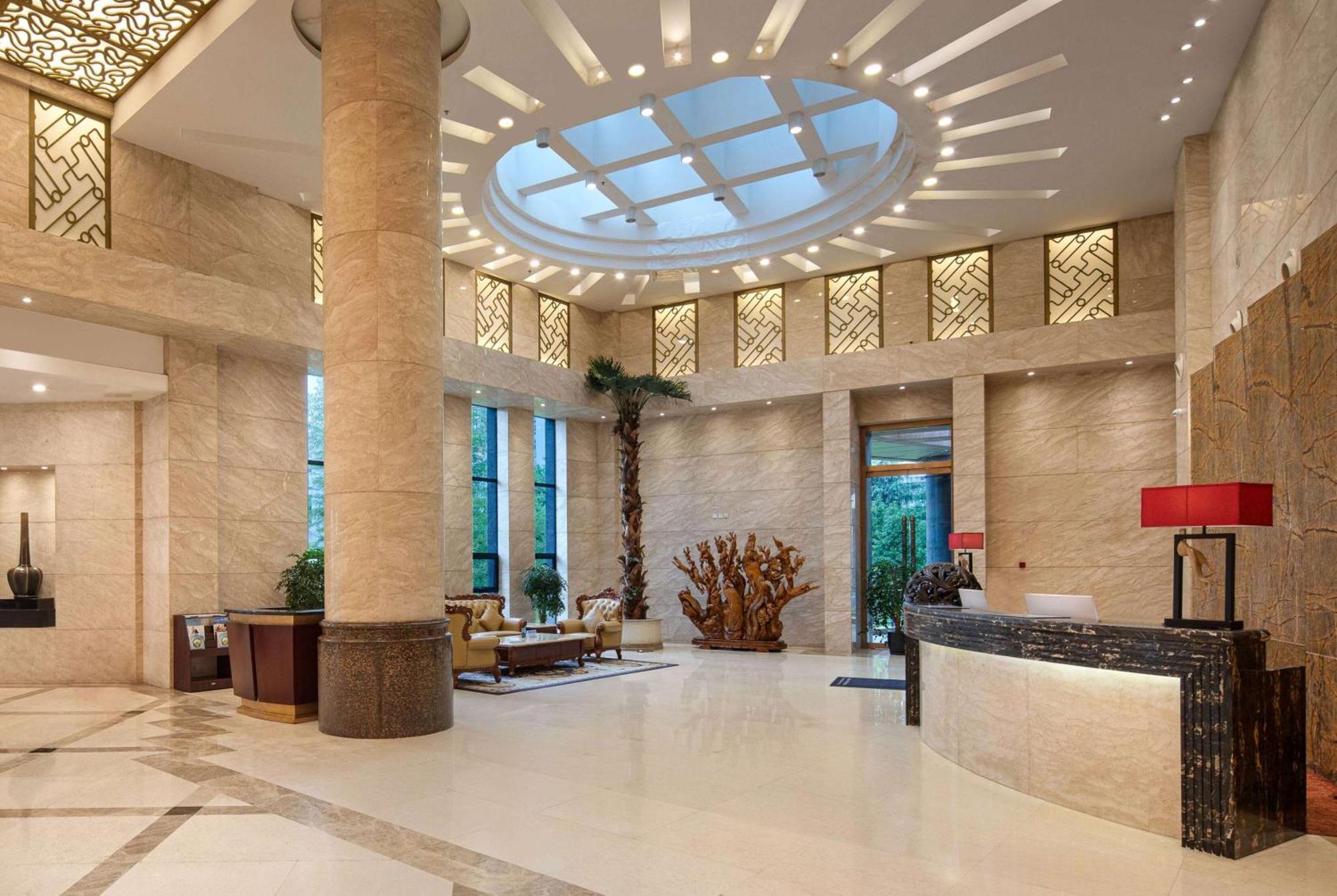 Hotel Ramada Plaza By Wyndham Chongqing West Esterno foto